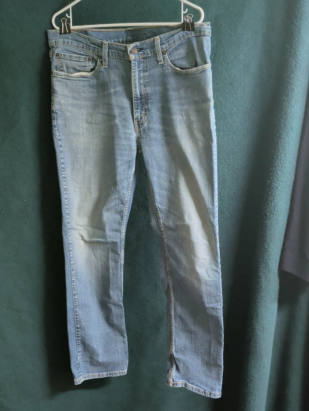 Levi's light blue denim jeans with tan leather patch